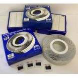 4 boxed Jessop's rotary magazines containing a quantity of assorted 1980's photographic negatives.
