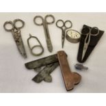 A collection of assorted vintage items. A vintage metal fleam, by Lee Newbury.