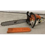 A STIHL MS-460 petrol chainsaw with 24 inch bar and plastic bar cover.