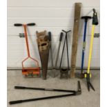 A collection of garden and maintenance tools.