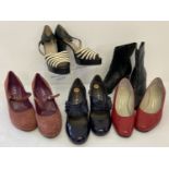 5 pairs of modern and vintage leather and suede shoes and boots.