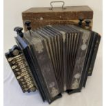 A boxed Victorian German Universal Melodeon, with turned wooden handles & leather hand strap.