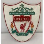 A Liverpool FC painted cast metal, shield shaped, wall hanging plaque.