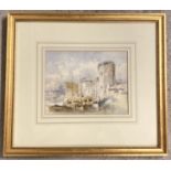 A framed and glazed watercolour of a European riverside scene with traditional buildings & boats.