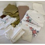 A box of vintage and modern table linen. To include hand embroidered table cloths.