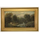 A gilt framed 19th century oil on canvas depicting a rural river scene with a gentleman on a bridge.