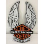 A Painted cast metal, wall hanging Harley Davidson Motorcycles wings plaque.