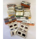 A box containing a quantity of cased photographic slides from the 1970's & 80's.