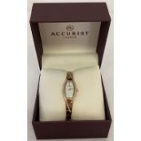 A boxed ladies wristwatch by Accurist.