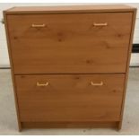 A modern beech effect 2 drawer shoe cabinet.