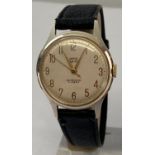 A vintage mens Empire wristwatch by Smiths with black leather strap.