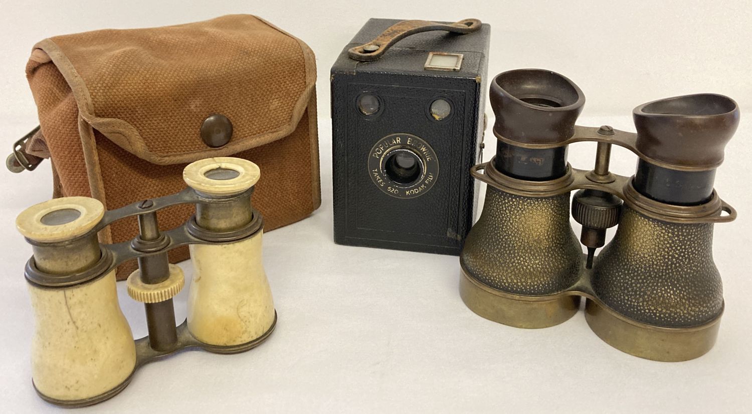 2 pairs of antique binoculars together with a Kodak Box Brownie camera in original canvas case.