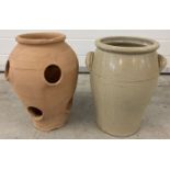 A terracotta strawberry pot together with a 2 handled salt glaze, garden urn style pot.