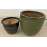 2 green glazed terracotta garden pots.