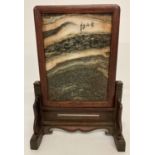 A small wooden framed Chinese dream stone screen.