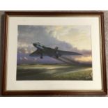 A framed and glazed Barry G Price print of a Vulcan bomber aircraft.
