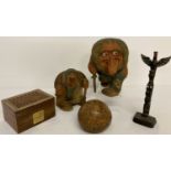 A collection of vintage carved wooden items to include 1950's trolls and highly carved seed pod.