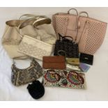 A collection of modern and vintage handbags, purses and lipstick cases.