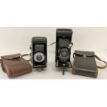 2 vintage Kodak folding cameras, both with leather cases.