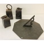 A metal garden sundial together with 3 vintage ring weights.
