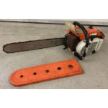 A STIHL 045AV petrol chainsaw with 24 inch bar and plastic bar cover.