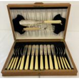 A wooden cased, 8 serving, vintage set of fish knives, forks & servers by John Sanderson, Sheffield.