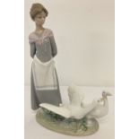 A boxed Lladro ceramic retired figurine #5659 "Barnyard Scene" by sculptor Antonio Ramos.