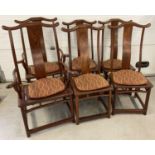 A set of 6 Chinese hardwood high back dining chairs with curved supports and shaped backs.