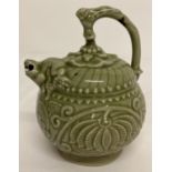 A Chinese Celadon glazed Yaozhou "backflow" teapot.