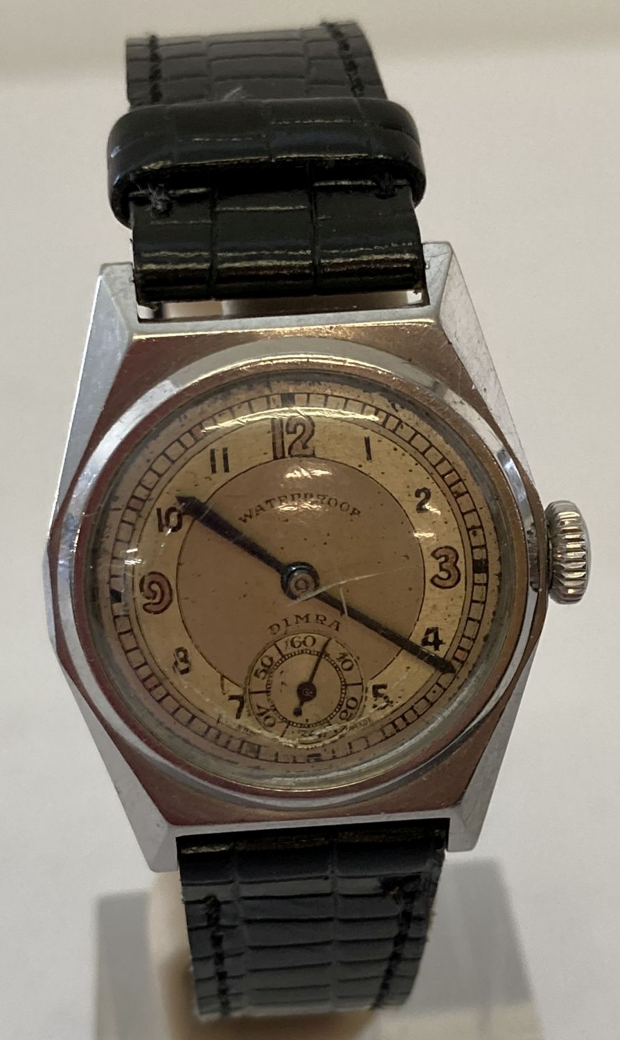 A vintage waterproof watch by Dimra with secondary dial.