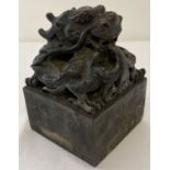 A heavy bronze Chinese square shaped seal with a fire breathing dragon shaped finial.