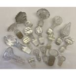 A collection of assorted vintage clear glass and cut crystal stoppers.