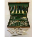 A vintage wooden cased canteen of cutlery by Atkin Brothers, Sheffield. Total of 75 pieces.
