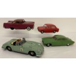 4 vintage toy cars. A pale green No. 5 tinplate racing car and a red tinplate car.