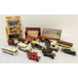 A collection of assorted boxed and unboxed diecast vehicles.