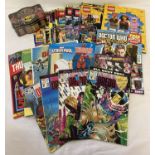 A small collection of comics and children's books together with a sealed tin of WWE trading cards.