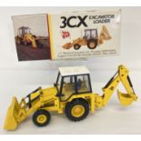 A boxed NZG diecast JCB 3CX Excavator #277, complete with interior packaging.