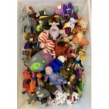 A large quantity of unsealed play worn McDonalds Happy Meal toys.