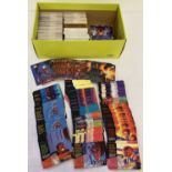 A shoe box containing a quantity of Marvel Masterpiece trading cards.