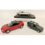 3 die cast model cars. A Corgi MGF, a Range Rover and a E Type Jaguar by Majorette.