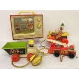 4 vintage Fisher Price toys.