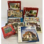 9 assorted 500 and 1000 piece puzzles in varying designs to include Gibson's, MB and Falcon.
