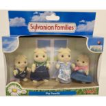 A boxed and unopened Flair Toys retired Sylvanian Families Pig family.