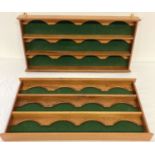 2 small wooden wall hanging model display shelves with green baize backing.