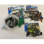 3 bagged Lego City play sets, with instruction booklets, to include #60022 Lego City Cargo Terminal.