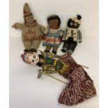 3 vintage soft bodied, cloth dolls together with an Oriental wooden stick puppet.