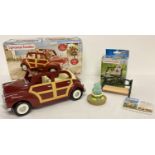 A boxed Flair Toys Sylvanian Families Burgundy Family car #4429.