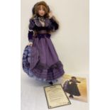 A boxed 1999 "Camille" porcelain collectors doll by Jan McLean from the French Floozie Collection.
