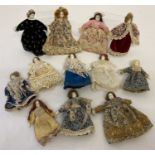 A collection of 12 assorted bisque headed dolls house dolls, in varying sizes.