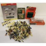 A collection of 00 gauge scale figures and accessories to include Britains, Hornby and Playcraft.